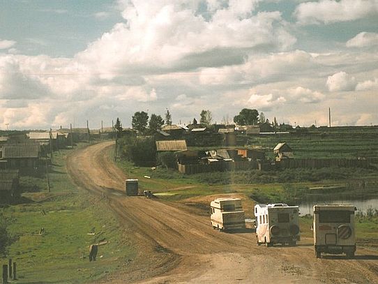 Siberian country road Dusty Road with motorhomes